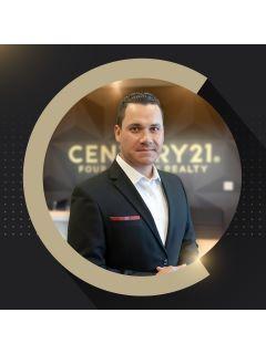 Julio Negron from CENTURY 21 Four Corners Realty
