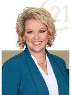 Lisa Thompson from CENTURY 21 Bessette Realty, Inc.