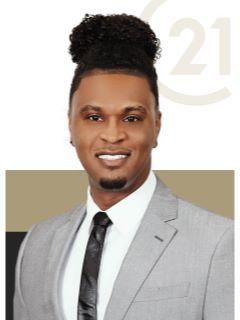 Tristian Thomas from CENTURY 21 Bessette Realty, Inc.
