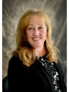 Teri May from CENTURY 21 Rainbow Realty