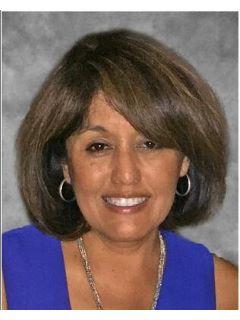 Zoila Athas from CENTURY 21 Village Realty