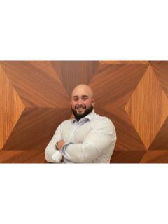 Aaron Cucina from CENTURY 21 New Millennium