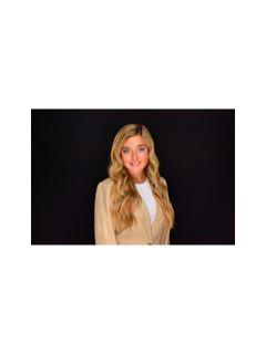 Taylor Kuehl from CENTURY 21 Signature Real Estate
