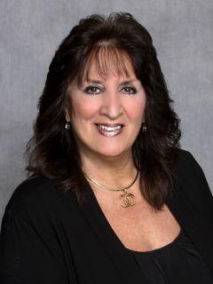 Elizabeth DeMarco from CENTURY 21 Action Plus Realty