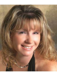 Laurie Ohlsson from CENTURY 21 Cor-Ace Realty