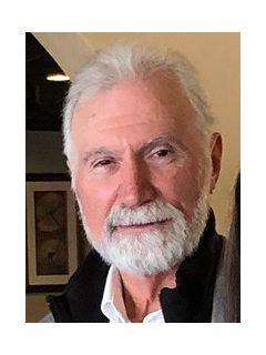 Tom Medlin from CENTURY 21 Russ Hollins Realtors
