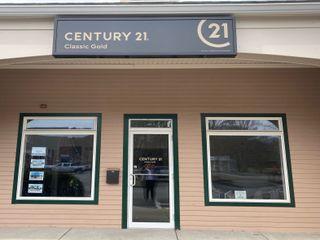 CENTURY 21 Tassinari Gold