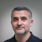 Headshot of Adam Yazici