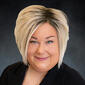 Headshot of Kelly Kuczewski of Kasper Realty Group