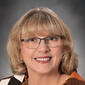 Headshot of Kim Reynolds