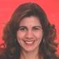 Headshot of Maria Silveira of MG Group