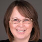Headshot of Ginger Miller of Home Advantage