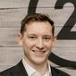 Headshot of Logan Burns of Pure Michigan Realty Group