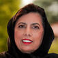 Headshot of Kay Bajwa of C21 Team International