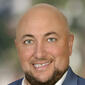 Headshot of John Marcario of J & B Real Estate Team