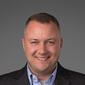 Headshot of Chris Parker of Consultation & Marketing Group