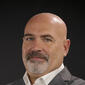 Headshot of Iain Robinson