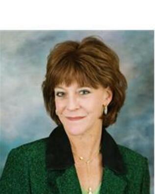 Headshot of Leslie Savage