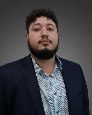 Headshot of Gustavo Reyna