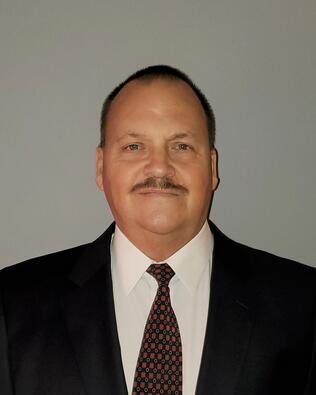 Headshot of Brian Konkoleski