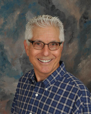 Headshot of Louis Bozzuto