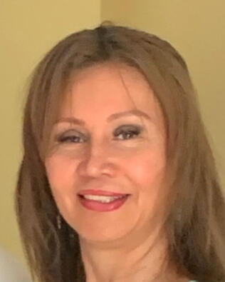 Headshot of Maggie Ulloa