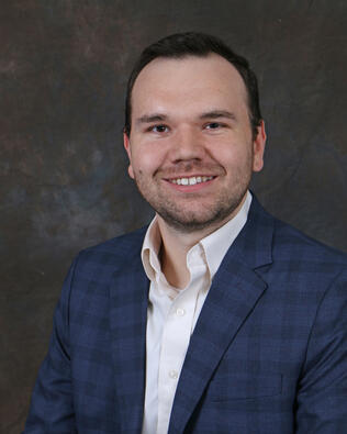 Headshot of Cameron Greer
