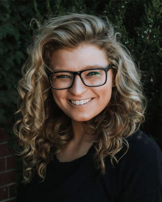 Headshot of Aris Kubash