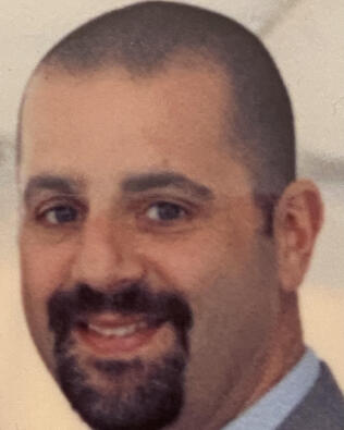 Headshot of Jason Brunjes