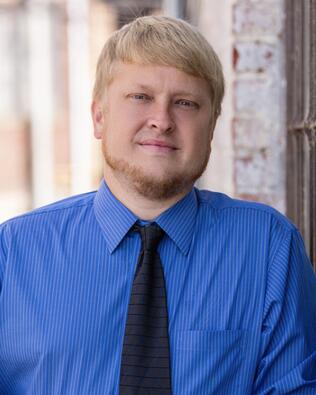 Headshot of Broyles