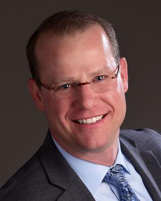 Headshot of Ryan Hawkins