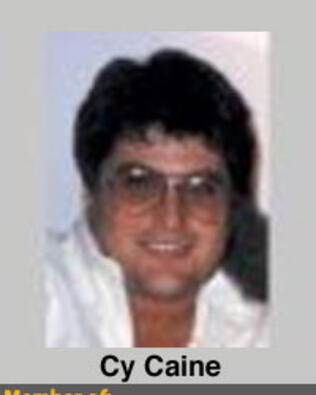 Headshot of Cy Caine