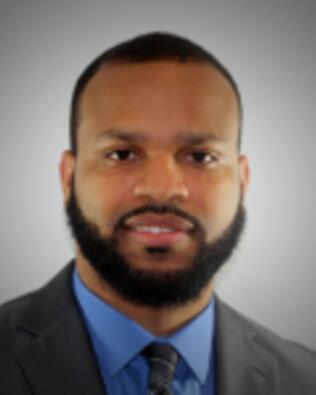 Headshot of Mike Maignan
