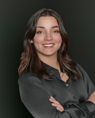 Headshot of Ana Elisa Delgado