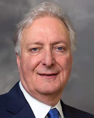Headshot of John M. Herman