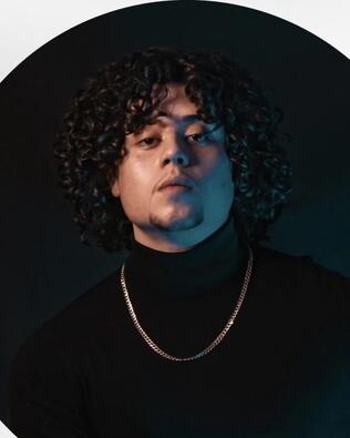 Headshot of Adam Gonzalez