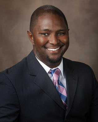 Headshot of Troy Price