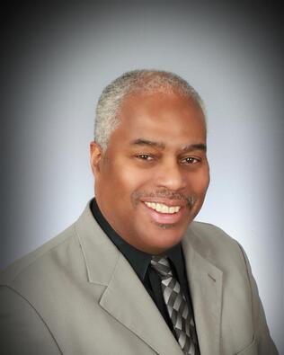 Headshot of Charles McShan