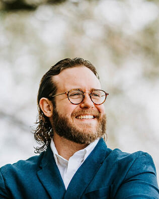Headshot of Justin Lena