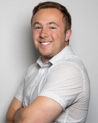 Headshot of Benjamin Schneider