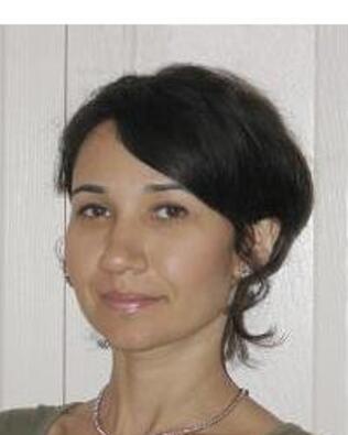 Headshot of Marina Grinberg