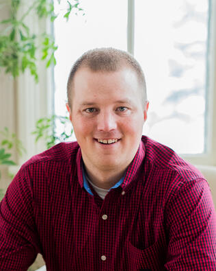 Headshot of Logan Hyrkas