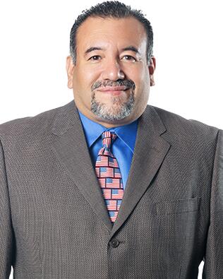 Headshot of George Ponce