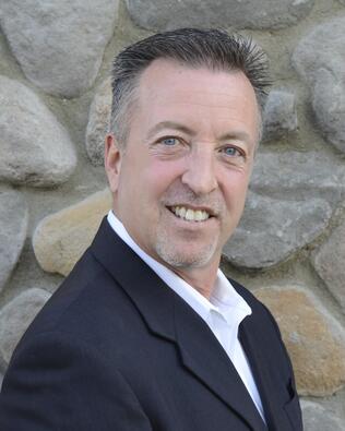Headshot of Paul Migliozzi