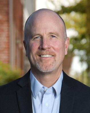 Headshot of Tom Mulkerin