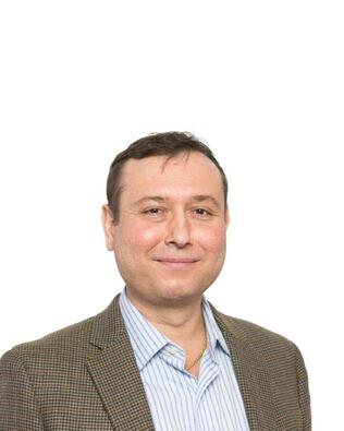 Headshot of Alexander Dimura