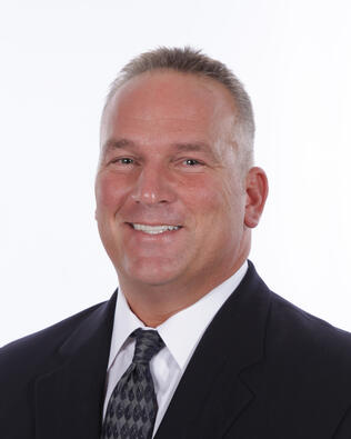 Headshot of T. Scott Sampson