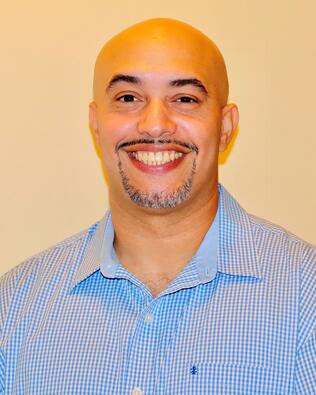 Headshot of James Caceres