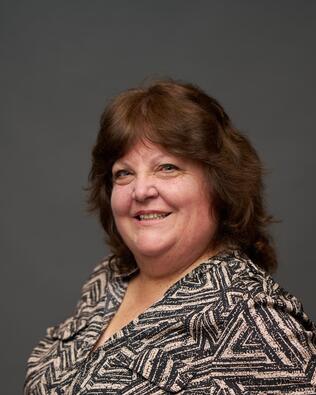 Headshot of Gina Hinds