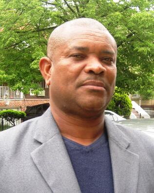 Headshot of CHARLES TYRELL